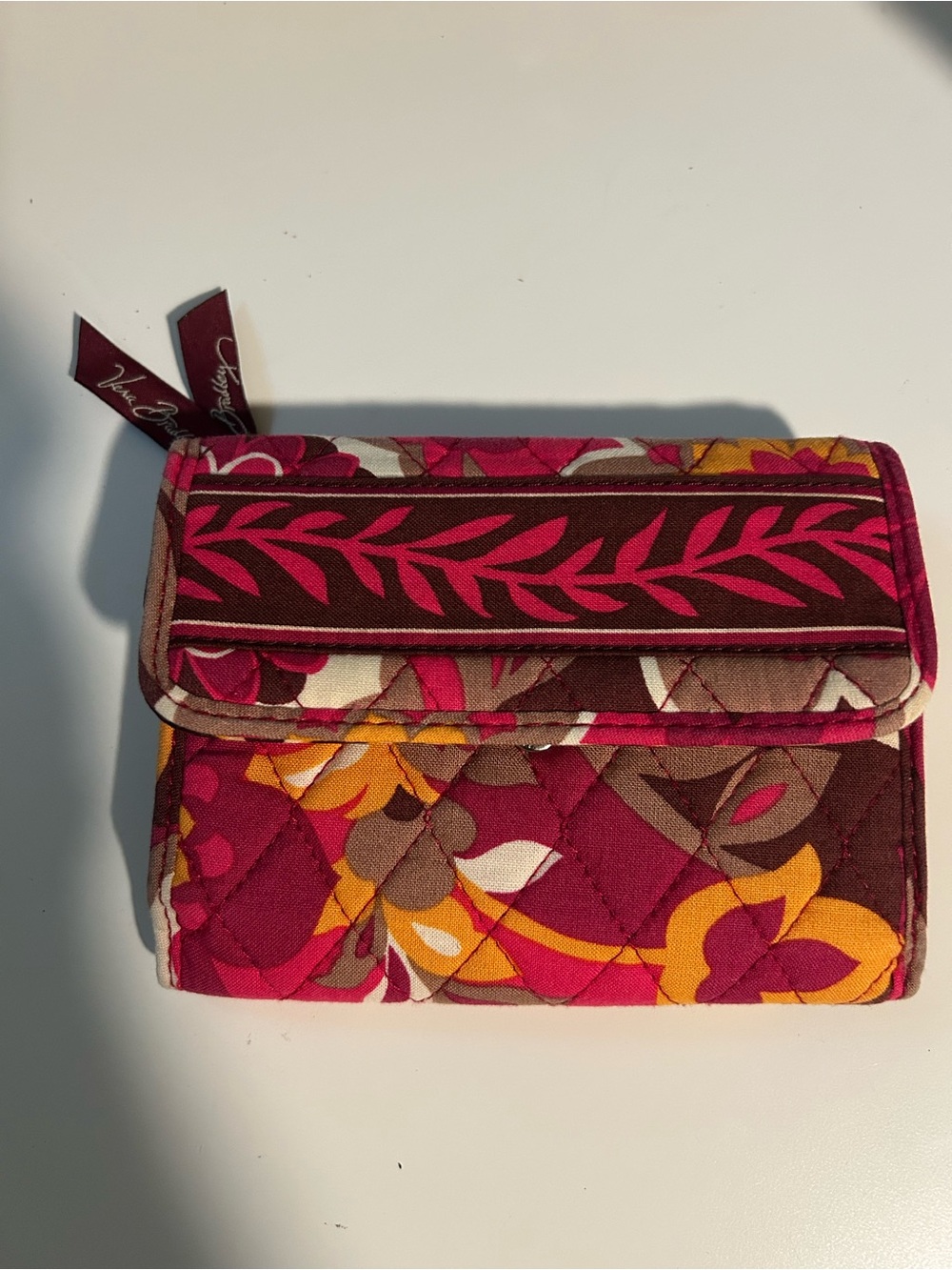 Vera Bradley quilted wallet with floral and leaf design
